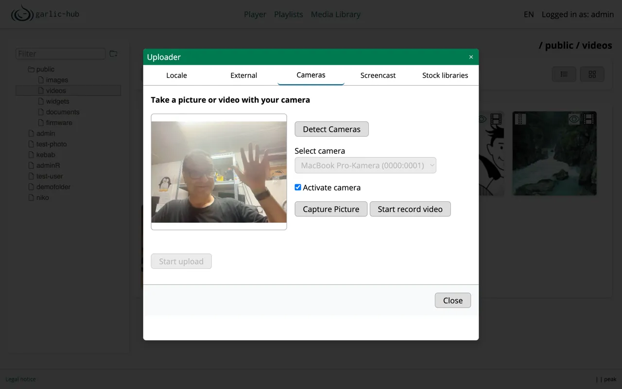 Once the camera is active, you see the live preview and can capture a still image or record a video.