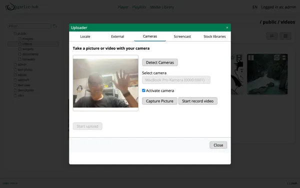 Once the camera is active, you see the live preview and can capture a still image or record a video.